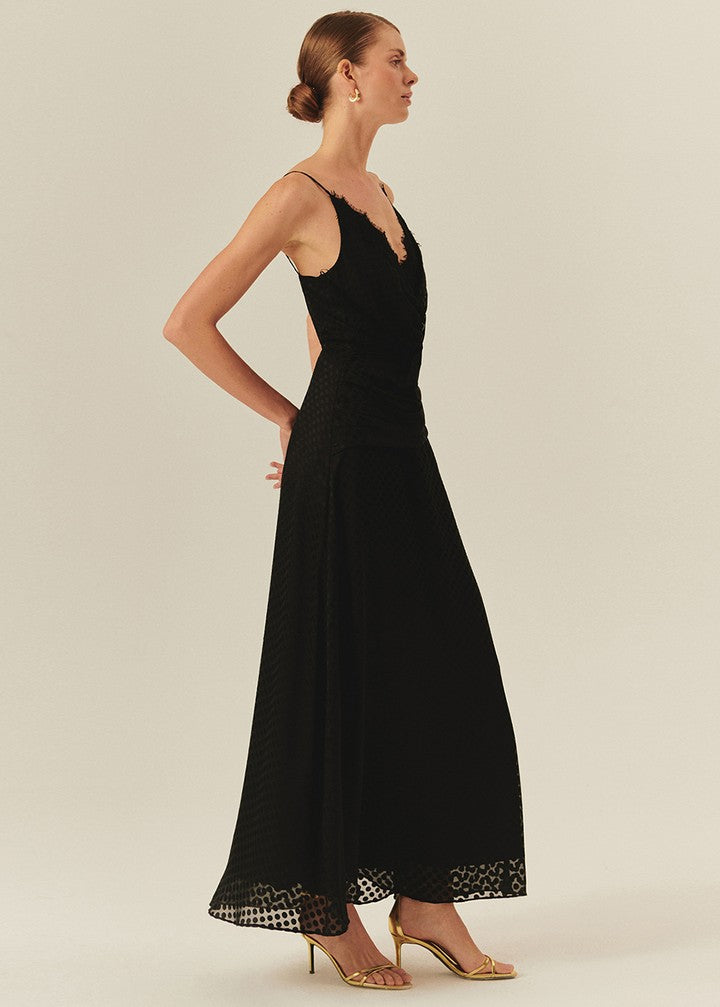 Sleeveless Black Maxi Dress with Polka Dot Accents and a Cinched Waist