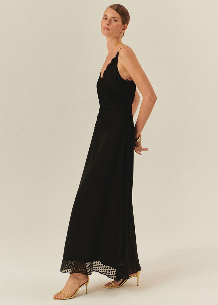 Sleeveless Black Maxi Dress with Polka Dot Accents and a Cinched Waist