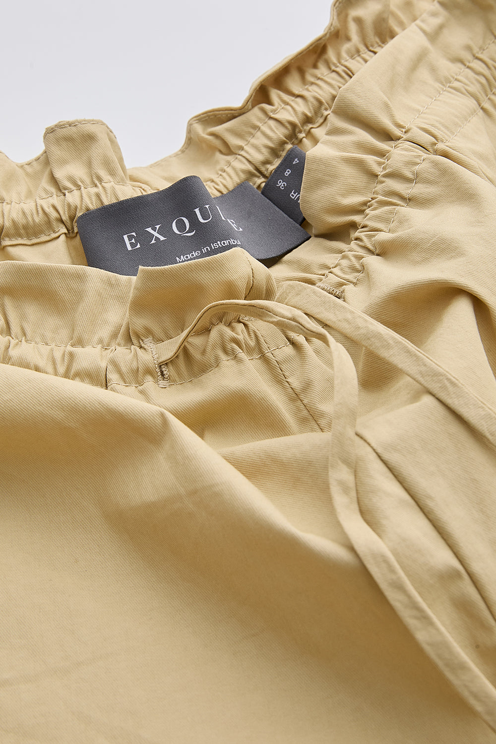 Tapered Woven Trousers - BEIGE