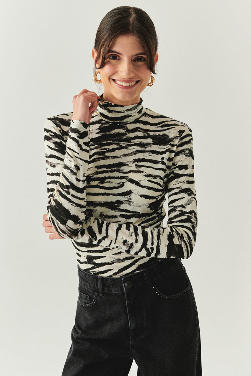 Laylani Zebra Print Turtleneck Knit Top