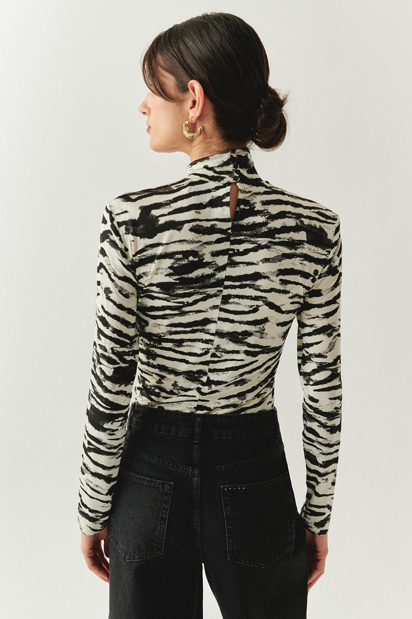 Laylani Zebra Print Turtleneck Knit Top