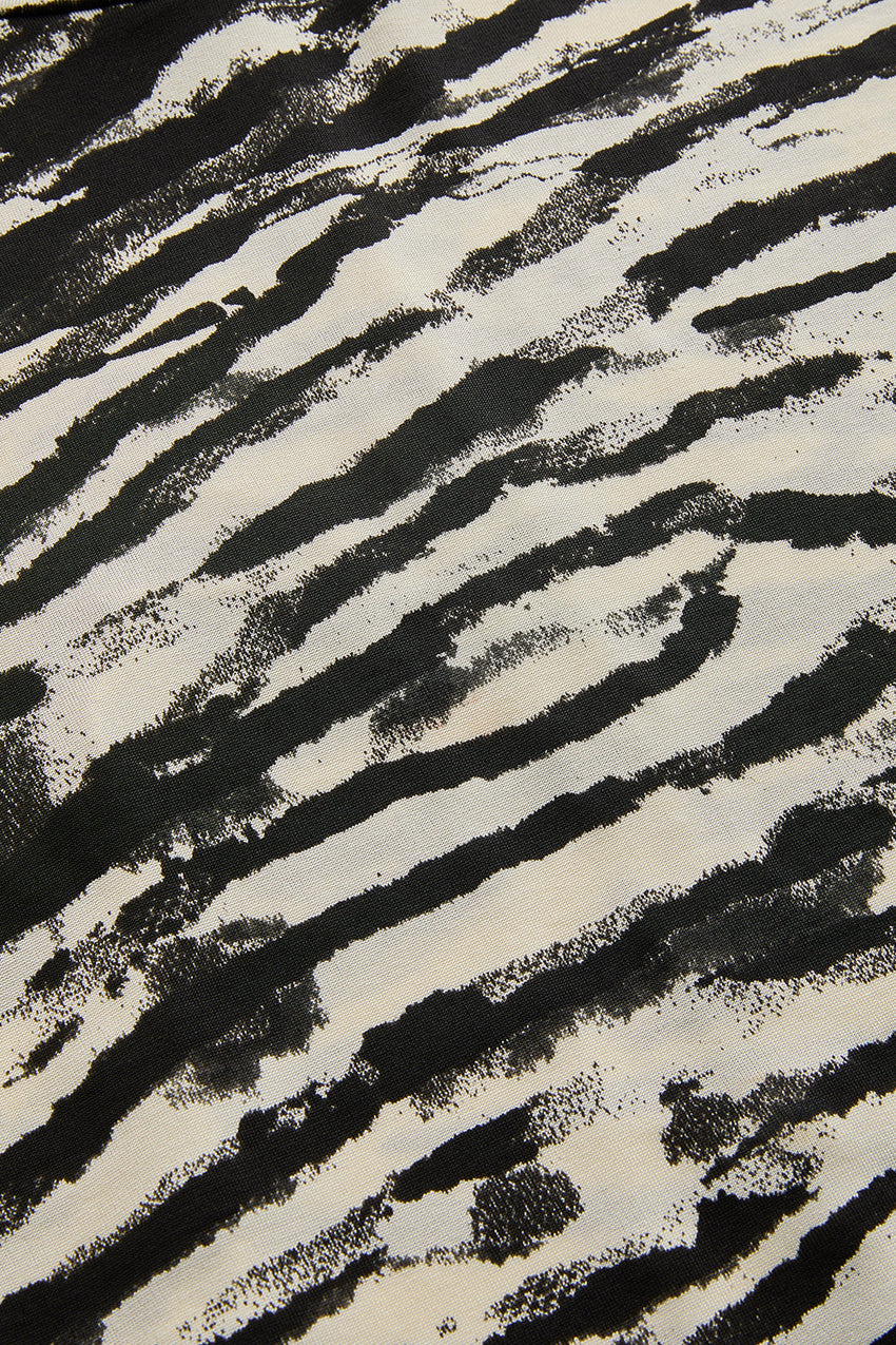 Laylani Zebra Print Turtleneck Knit Top